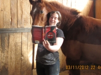 Reading Invincible to my horse Jazz.