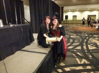Yising winning the Simi doll at the interview panel at Dragoncon.