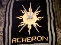 My homage to the best character ever!  I took inspiration from the Dark Hunter afghan I saw on this site and crocheted my version of Acheron's sun with three lightning bolts going through it