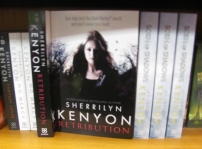 Books on the shelf in the Capetown, South Africa bookstore. Cheers! Teri